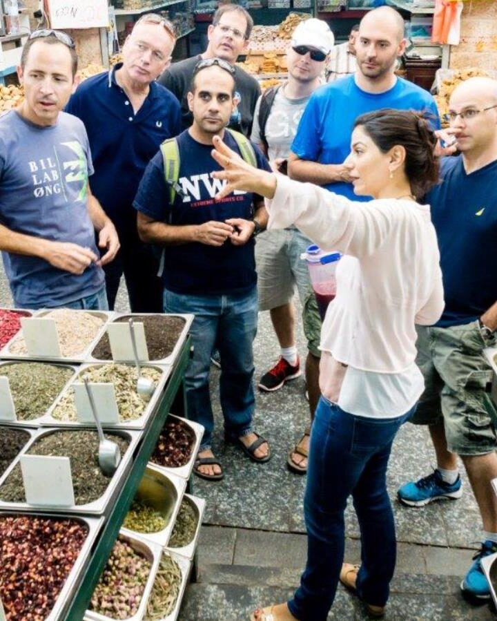 Tali Friedman leading a group around Jerusalem’s open marketplace. Photo: courtesy