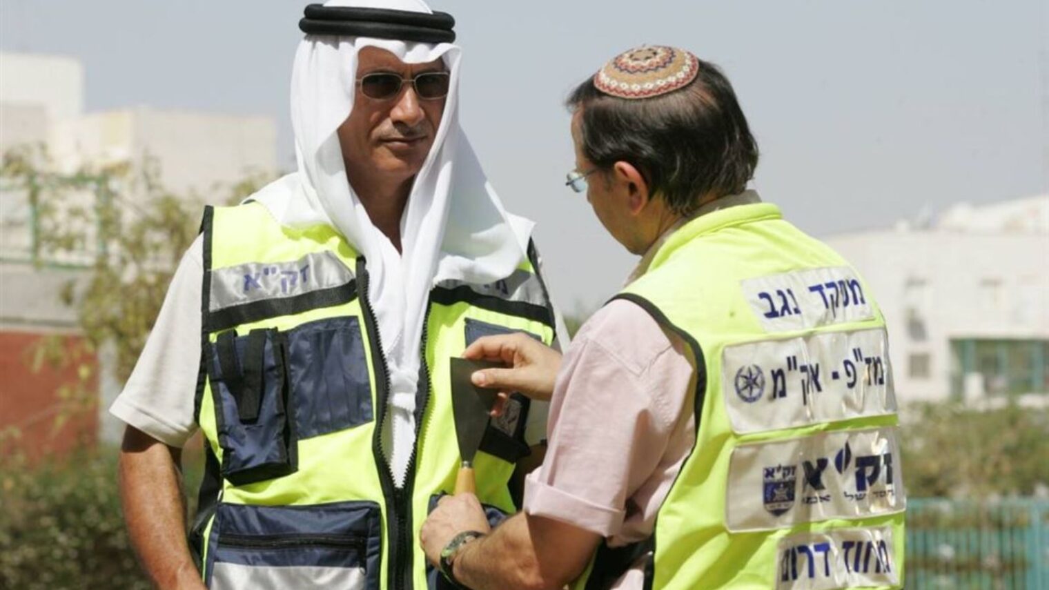 Arab and Jewish ZAKA volunteers in the Negev prepare to rescue victims together. Photo: courtesy