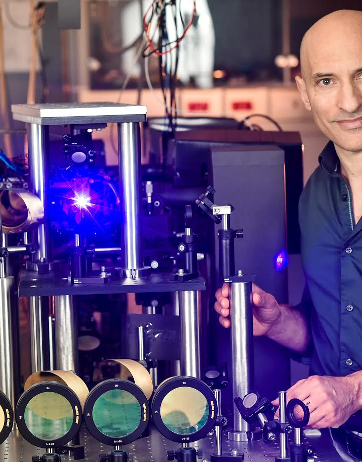The blue light emanates from the location of the sonic black hole in Prof. Jeff Steinhauer’s Atomic Physics Lab at the Technion-Israel Institute of Technology. Photo: courtesy