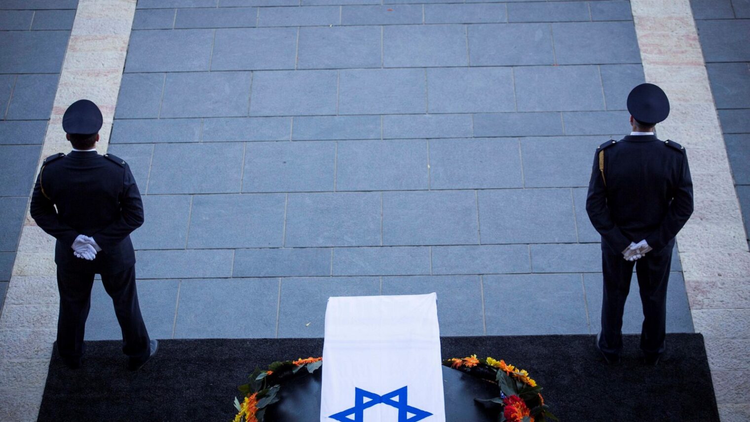 The Knesset Honor Guard stand by the coffin of Former Israeli President Shimon Peres ahead of the ceremony held at the Knesset where the public were invited to pay their last respects before his burial, in Jerusalem, on Thursday.