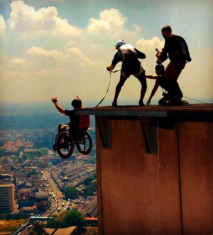 Lonnie Bissonnette uses a wheelchair fitted with SoftWheels to perform BASE jumps around the world. Photos via facebook.com/TheLonnieBissonnette