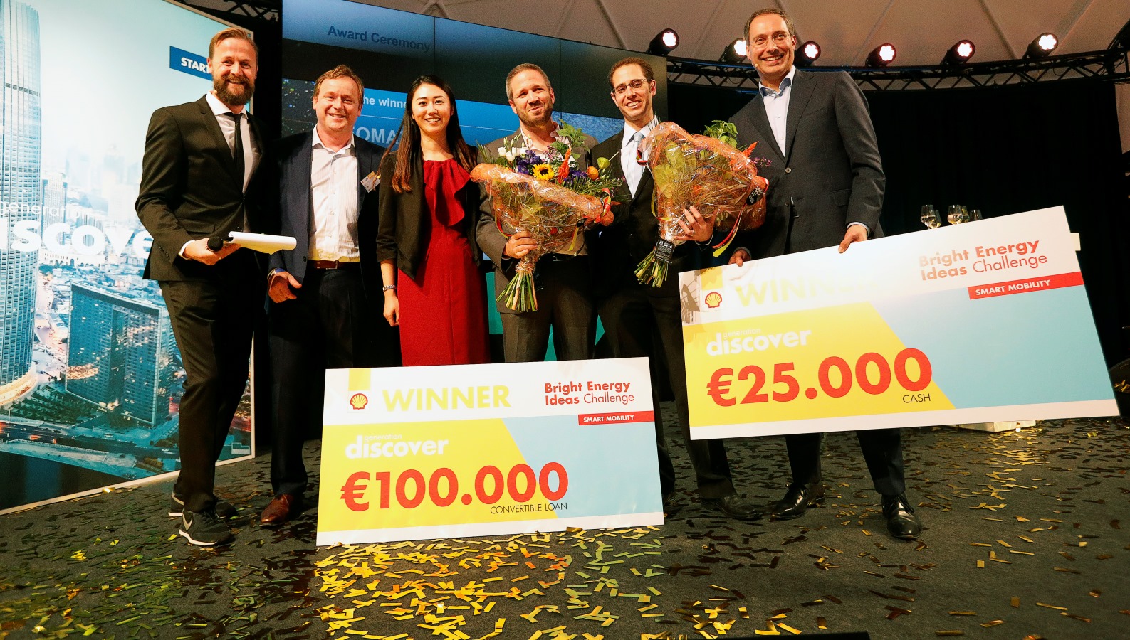 Geert van der Wouw, managing director of Shell Technology Ventures, second from left, with Shell and Neomatix executives at the awarding of first prize to Neomatix in the Shell Bright Energy Ideas Challenge in The Netherlands. Photo by Jiri Buller/AP images for Shell