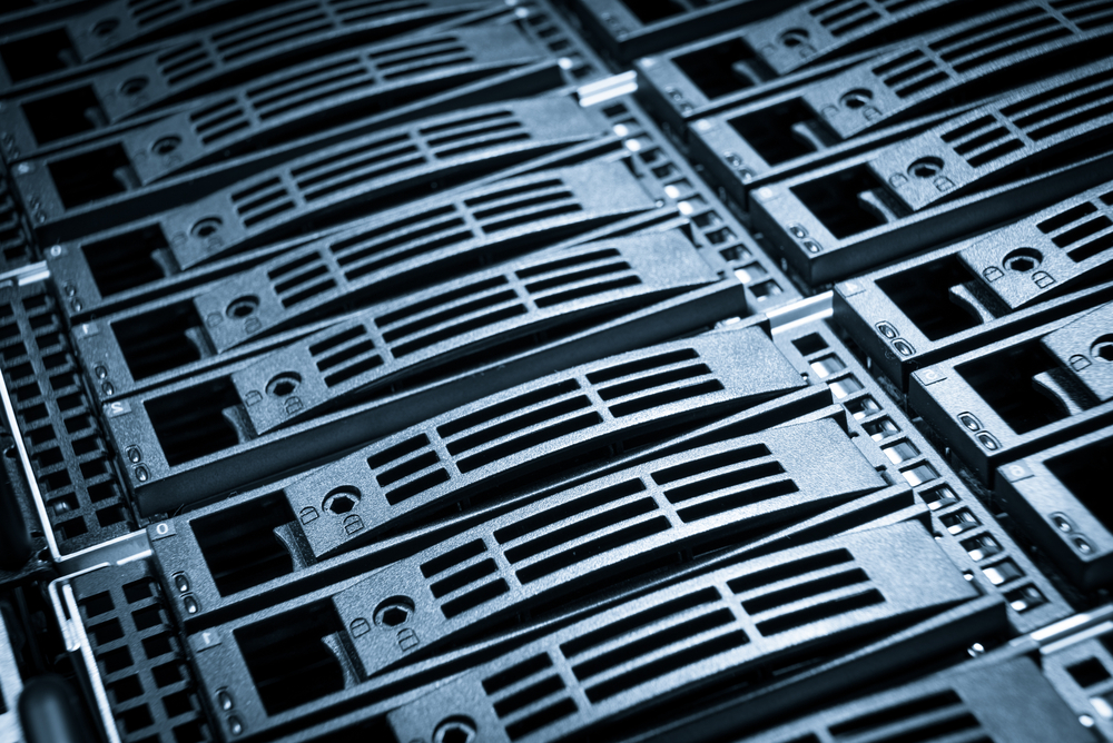 Close-up of hard drives in a data center. Photo via Shutterstock.com