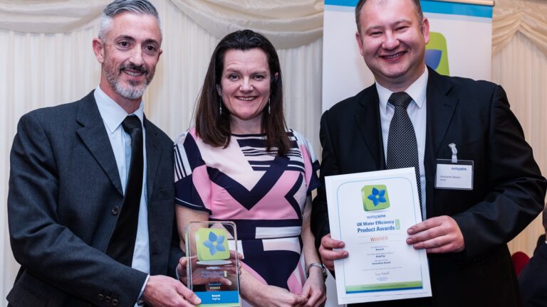 BwareIT CTO Ariel Drach, left, and CEO Konstantin Berezin flanking Waterwise board member Nicci Russell at the UK Water Efficiency Product Awards in London, March 7, 2017. Photo by Tim Hodges