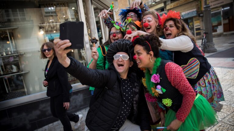 Costumed Israelis in central Jerusalem ahead of the Jewish holiday of Purim. Photo by Yonatan Sindel/FLASH90