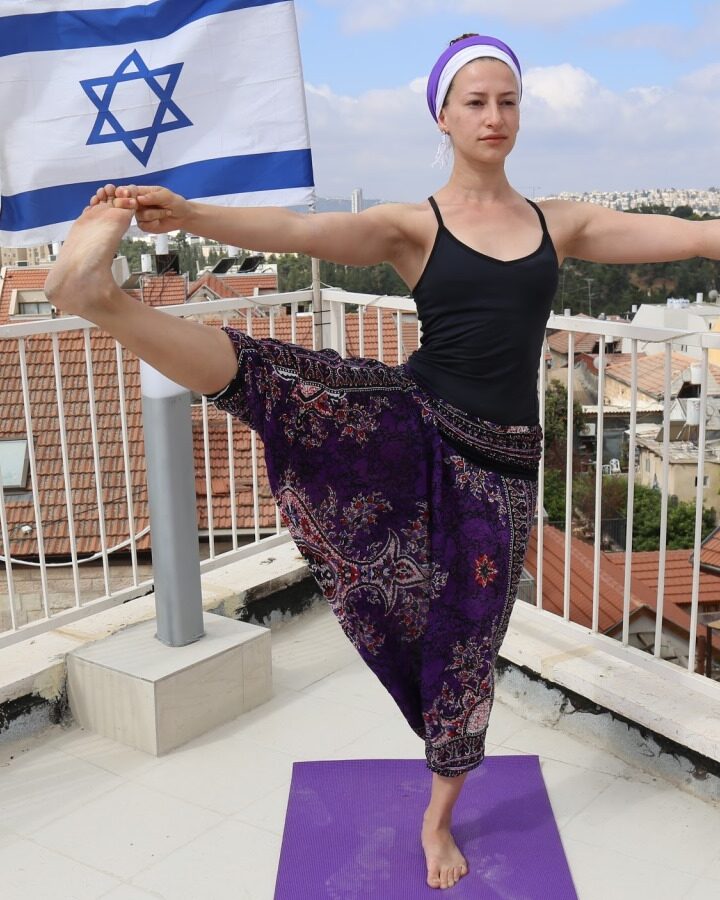 Rooftop Yoga in Jerusalem with instructor Ayo Oppenheimer-Abitbol, overlooking the Israeli Parliament and Judean Hills. Photo by David Abitbol/Jewlicious