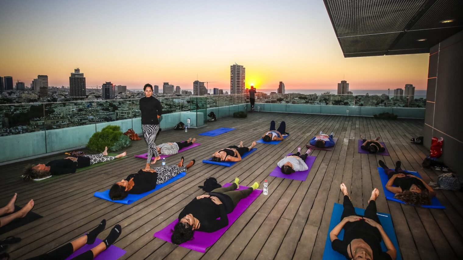 Or even on the rooftop. A yoga class on a rooftop in Tel Aviv. Photo courtesy of Tel Aviv municipality