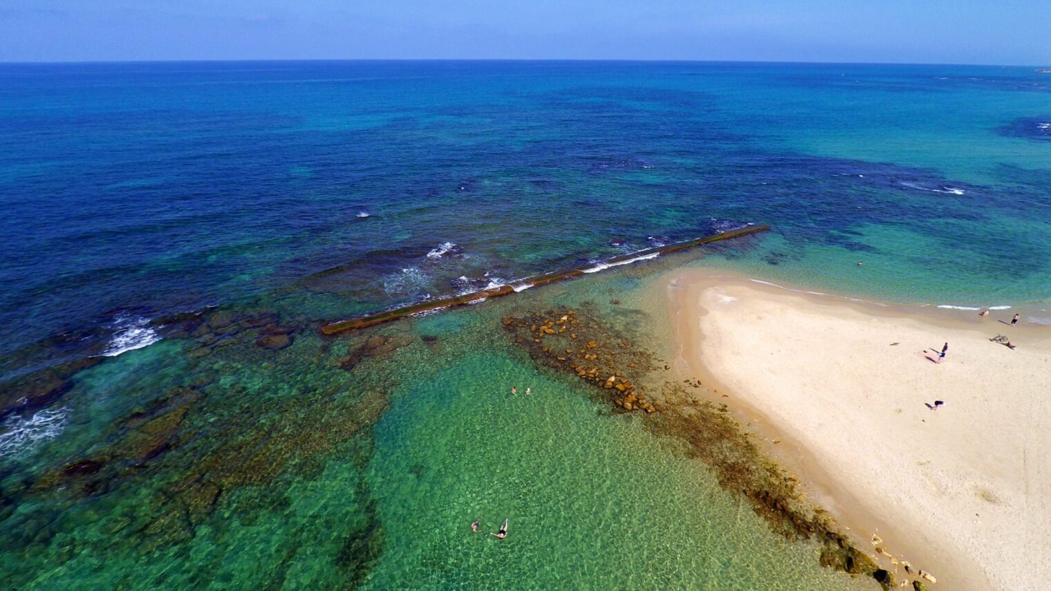 Because we have beaches that look like this. The beach at Caesarea. Photo by Eyal Asaf