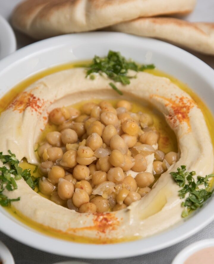 Cap: A plate of hummus at the Hummus Ha'Giva in the French Hill neighborhood of Jerusalem. Photo by Nati Shohat/FLASH90