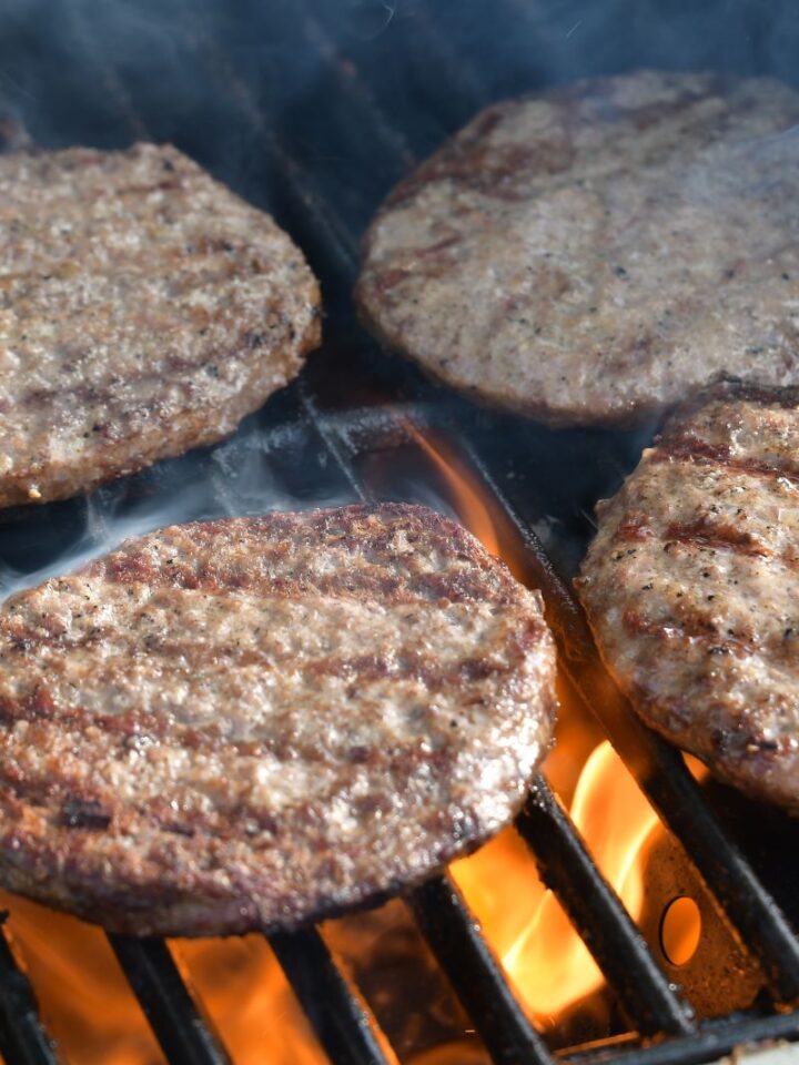 Image of grilled burgers via Shutterstock.com