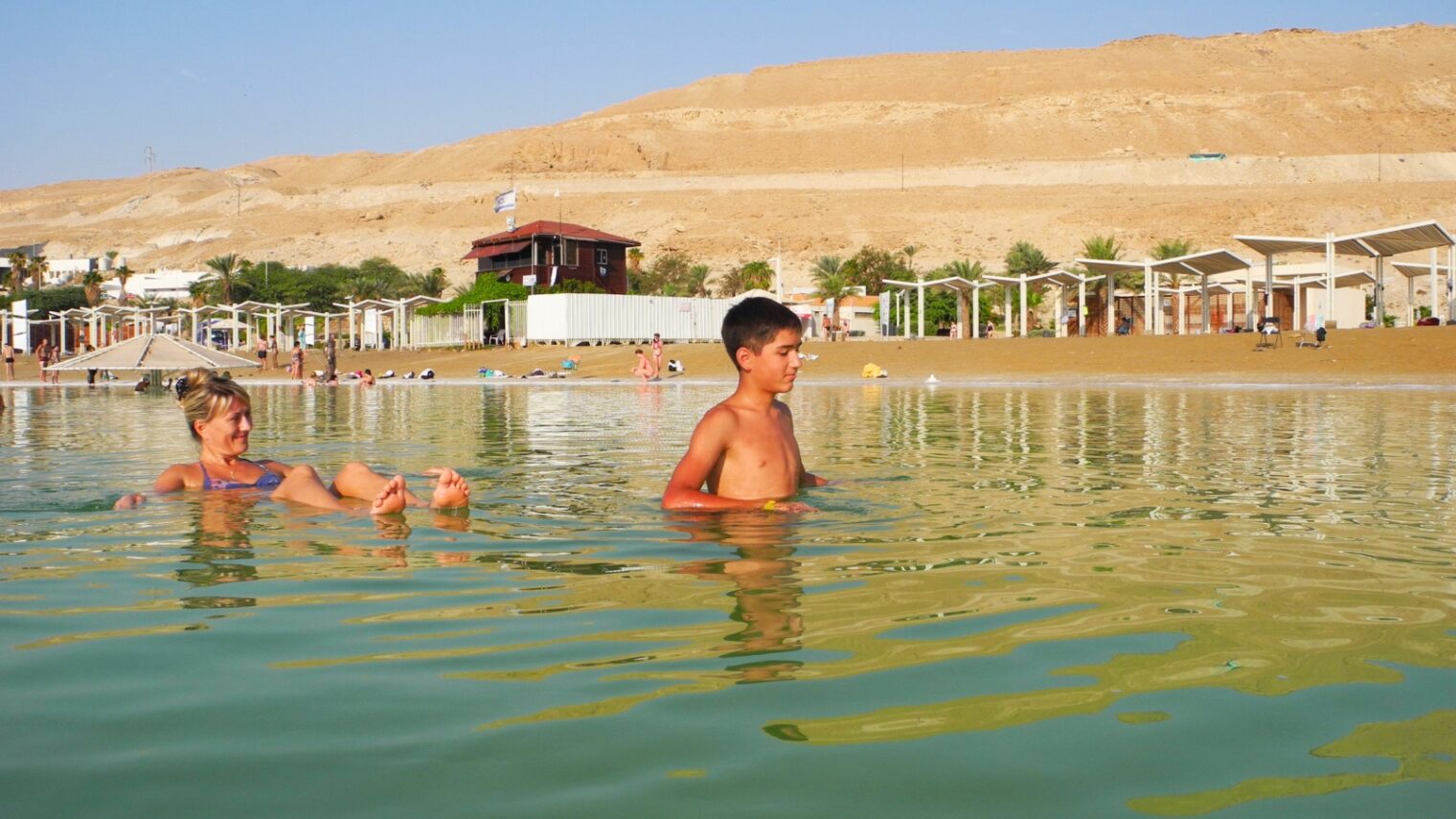 Floating in the Dead Sea is a favorite family activity. Photo by Jana Janina/Shutterstock.com
