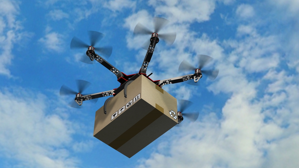 Drone delivering a package. Photo via Shutterstock.com