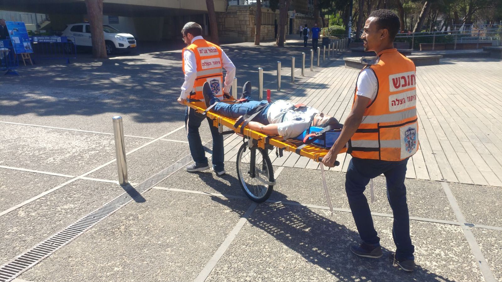 Michael Adda, left, and Ro’ee Etyanash testing their innovative stretcher at the Technion in Haifa. Photo: courtesy