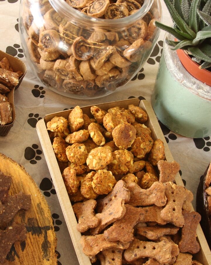 DogBarie vegan dog treats include Carob and Peanut Butter Rolls (in glass jar), Cranberry Squares, Street Cats, Carrot and Parsley Drops, Peanut-Butter Bones and Pampering Hearts. Photo: courtesy