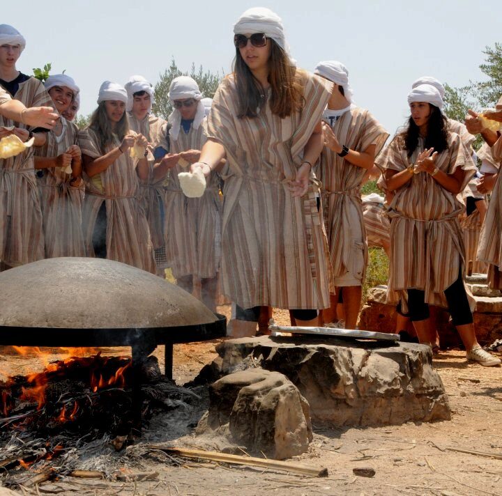 Baking pita at Kfar Kedem. Photo: courtesy