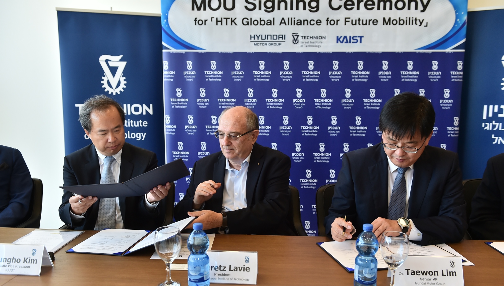 At the MOU signing ceremony, from left, Prof. Joungho Kim of KAIST, Technion President Prof. Peretz Lavie, and Dr. Taewon Lim, head of Hyundai Technology Innovation Center. Photo by Nitzan Zohar/Technion spokesperson's office