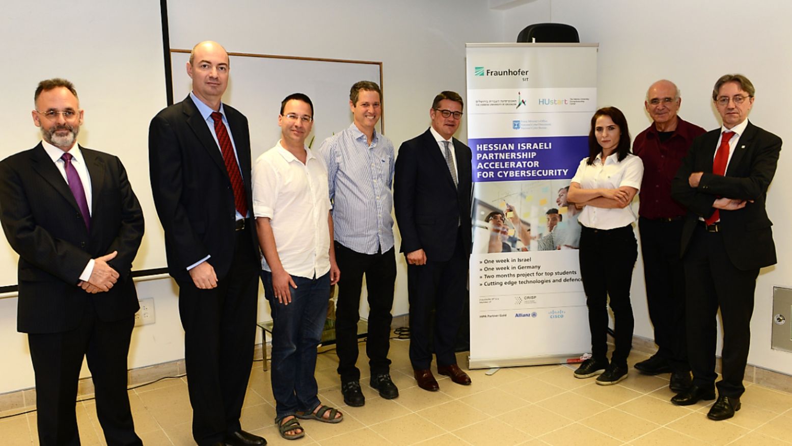 From left, Iddo Moed, Cybersecurity Coordinator, Israeli Ministry of Foreign Affairs; Yigal Unna, Head of Cybersecurity Technology Unit, Israeli National Cybersecurity Directorate; Prof. Michael Schapira, School of Computer Science and Engineering, Hebrew University; Prof. Yair Weiss, Dean, School of Computer Science and Engineering, Hebrew University; Boris Rhein, Hessian Ministry of Higher Education, Research and the Arts, Germany; Dr. Haya Shulman, Department Director, Fraunhofer SIT, Germany; Prof. Danny Dolev, Head of the Cybersecurity Center, School of Computer Science and Engineering, Hebrew University; Prof. Michael Waidner, Director of Fraunhofer SIT, Germany. Photo: courtesy