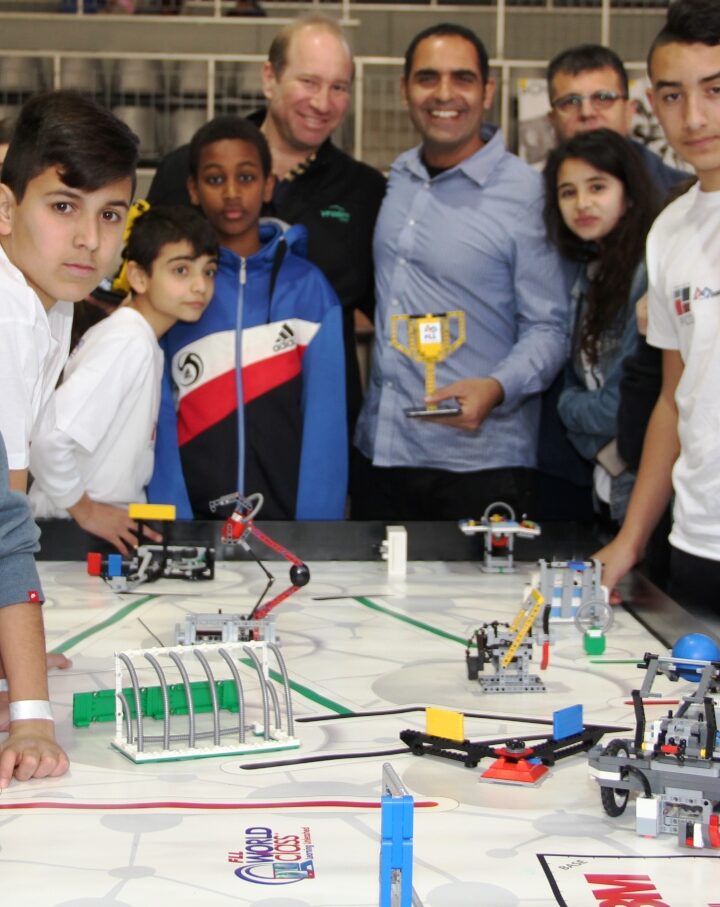 A PICO Kids robotics team wins a trophy. Photo: courtesy