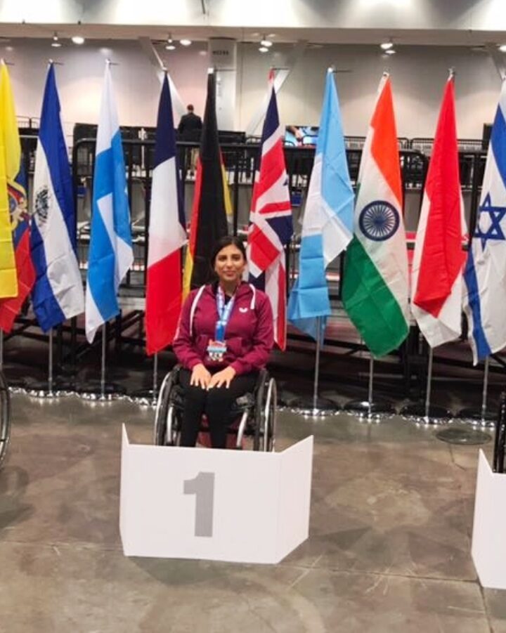 Caroline Tabib, center, accepting her gold medal in Las Vegas, December 2017. Photo courtesy of the Israel Paralympic Committee