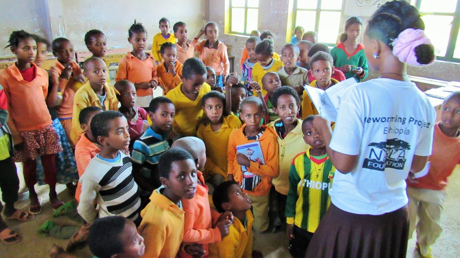 An Ethiopian NALA volunteer teaching a class how to avoid being infected by parasitic flatworms. Photo: courtesy