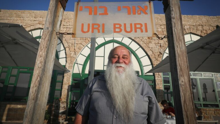 Israeli restaurateur Uri Jeremias outside his world-famous fish restaurant 'Uri Buri' in the Old City of Acre, Northern Israel. Photo by Nati Shohat/FLASH90