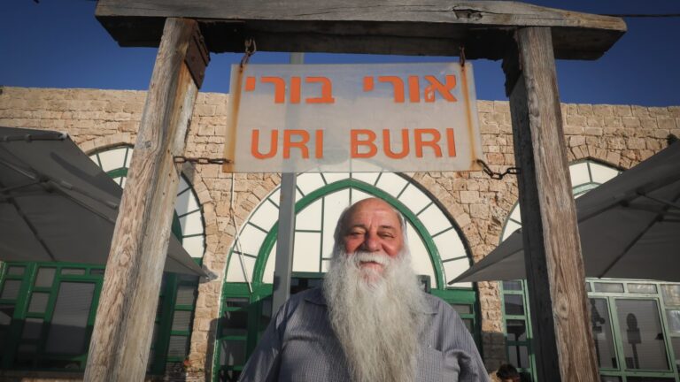 Israeli restaurateur Uri Buri outside his world-famous fish restaurant, Uri Buri, in the Old City of Acre (Akko). Photo by Nati Shohat/FLASH90