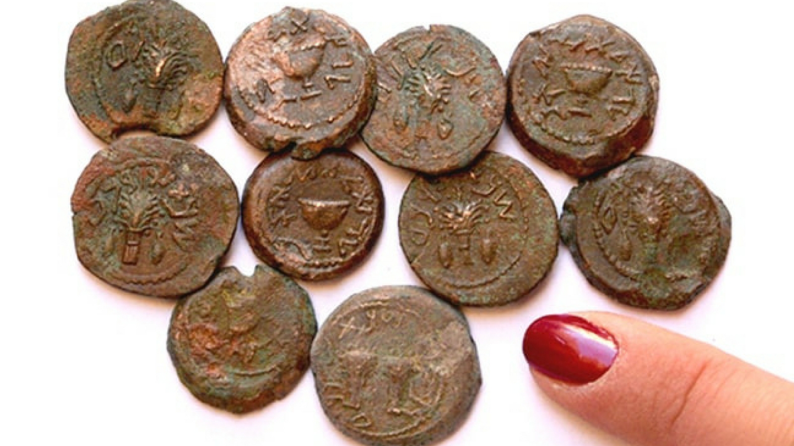 Bronze coins discovered in cave near Jerusalem Temple Mount. Photo by Eilat Mazar/Hebrew University