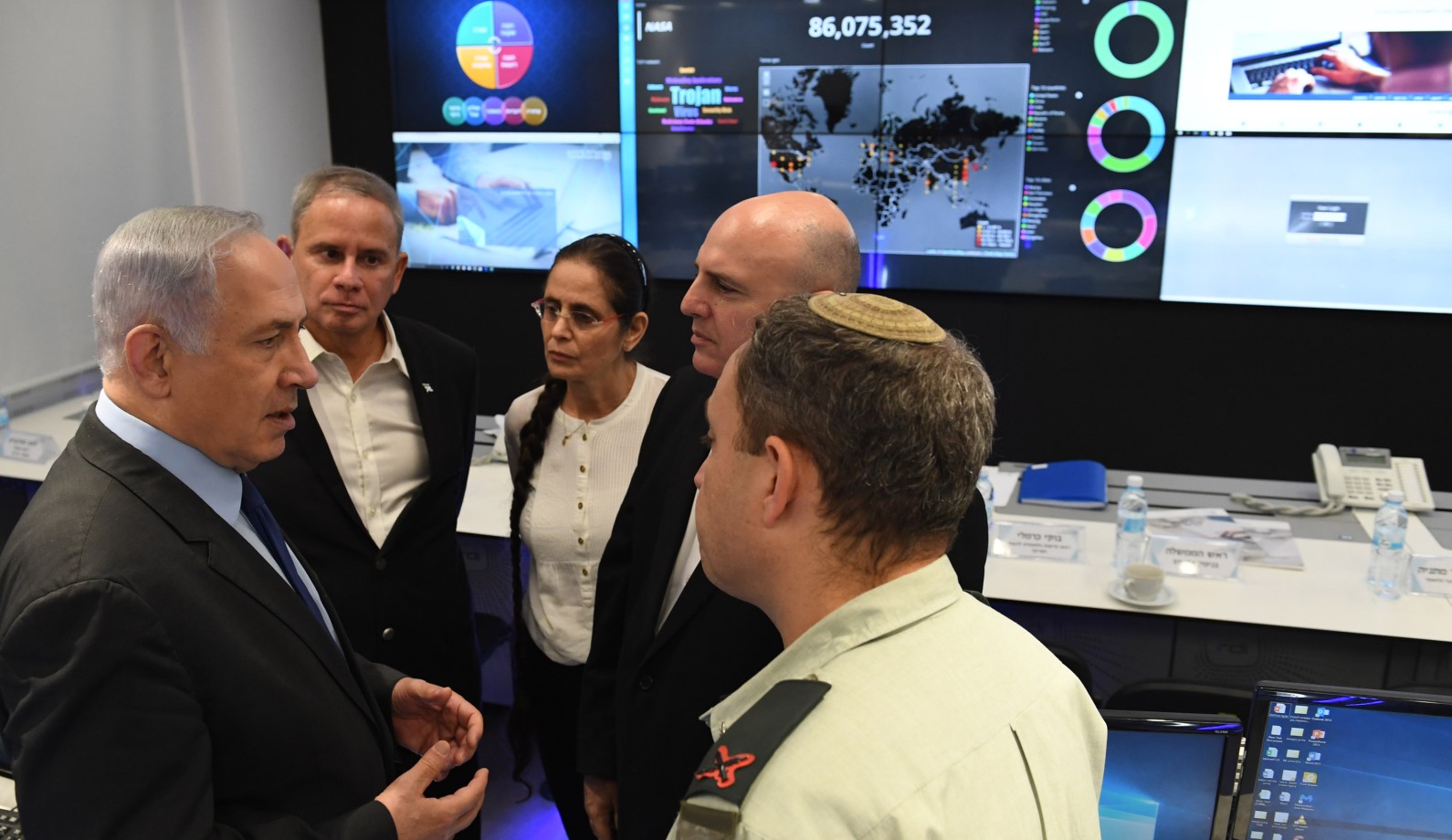 Israeli prime Minister Benjamin Netanyahu visits CyberSpark in Beersheva with Buki Carmeli, head of the National Cyber Defense Authority, and Eviatar Matania, head of the National Cyber Bureau in the Prime Minister's office. Photo by Kobi Gideon/GPO