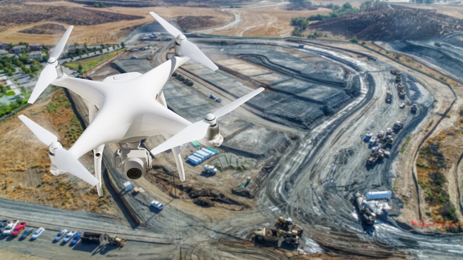 A UAV monitoring a construction site. Photo by Andy Dean Photography/Shutterstock.com