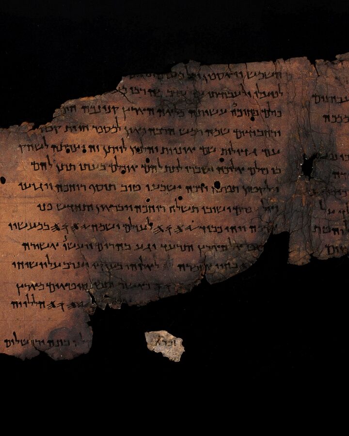 The Great Psalms Scroll (11Q5) together with the new fragment containing Psalm 147:1. Photo by Shai Halevi/Leon Levy Dead Sea Scrolls Digital Library