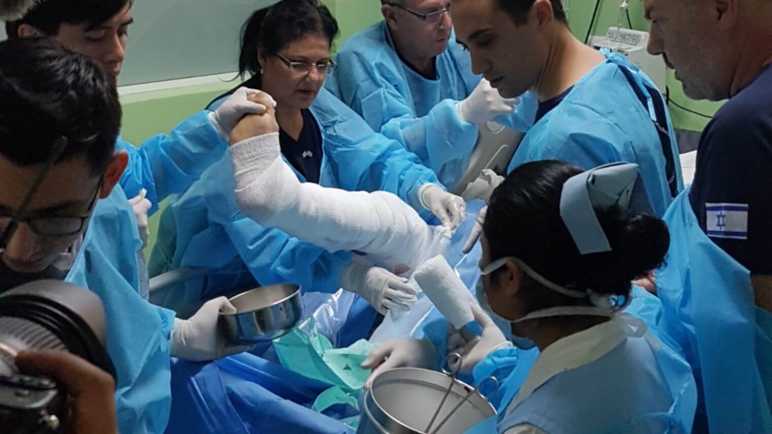 Israeli medical team treating a burn victim in Guatemala Cityâ€™s Roosevelt Hospital following the Fuego volcano eruption. Photo courtesy of the Ministry of Foreign Affairs