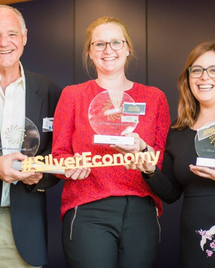 Project Ray CEO Boaz Zilberman, left, accepting the first Silver Economy Award for best for-profit organization. Photo: courtesy