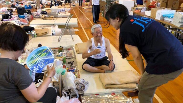 JISP-IsraAID workers with Japanese people displaced by flooding, Okayama Prefecture. Photo: courtesy