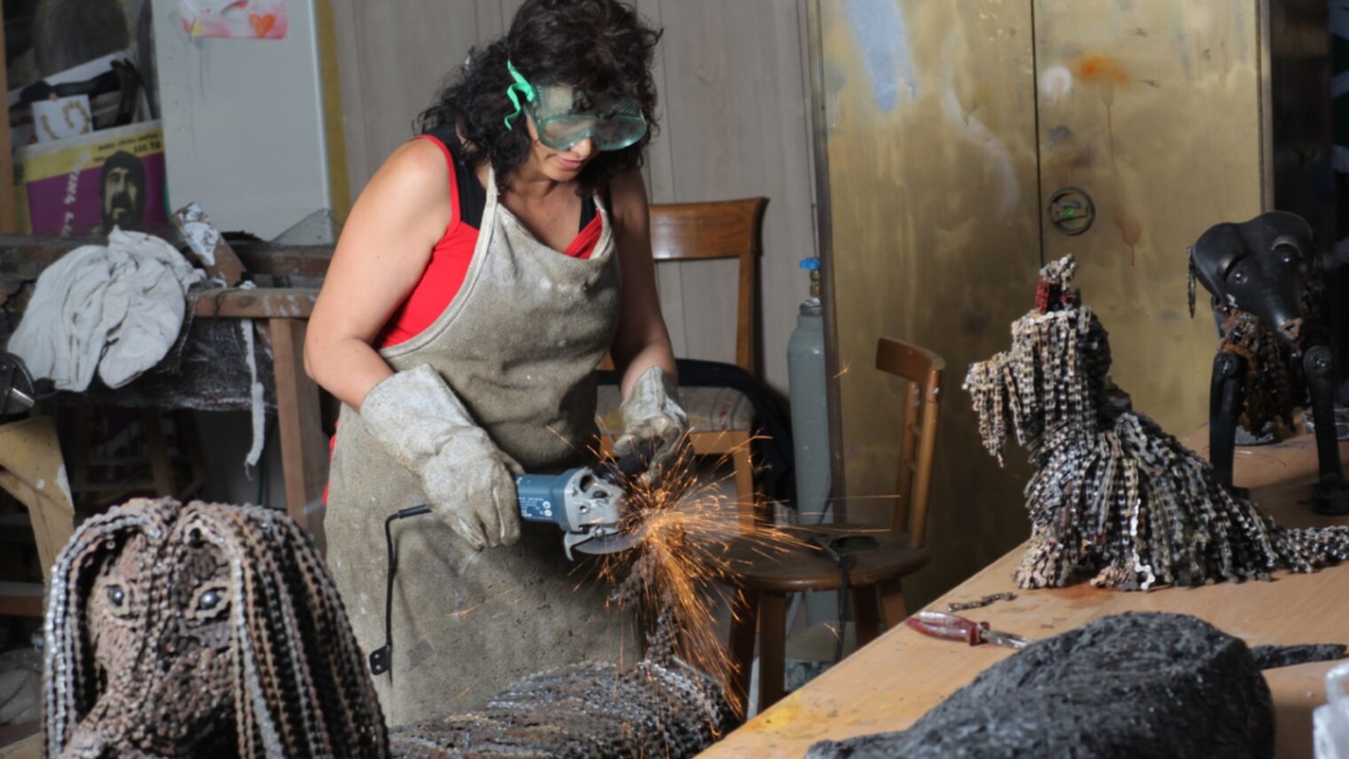 Nirit Levav Packer working in her gallery in Jaffa. Photo: courtesy