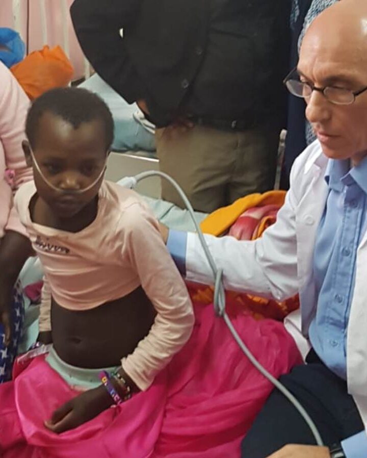 Dr. Itay Shavit, head of pediatric ER at Rambam Health Care Campus in Haifa, examining a child in Kenya. Photo: courtesy