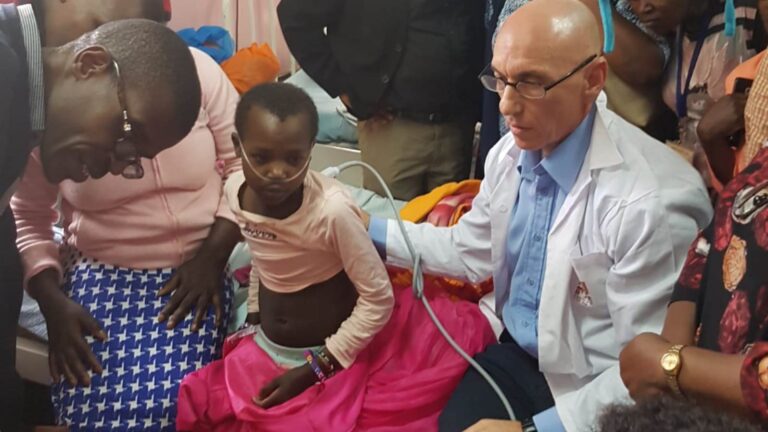 Dr. Itay Shavit, head of pediatric ER at Rambam Health Care Campus in Haifa, examining a child in Kenya. Photo: courtesy