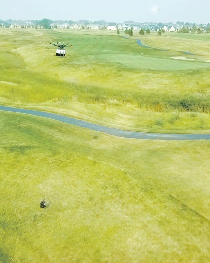 A drone delivering food to golfers at King’s Walk in North Dakota. Photo courtesy of Flytrex