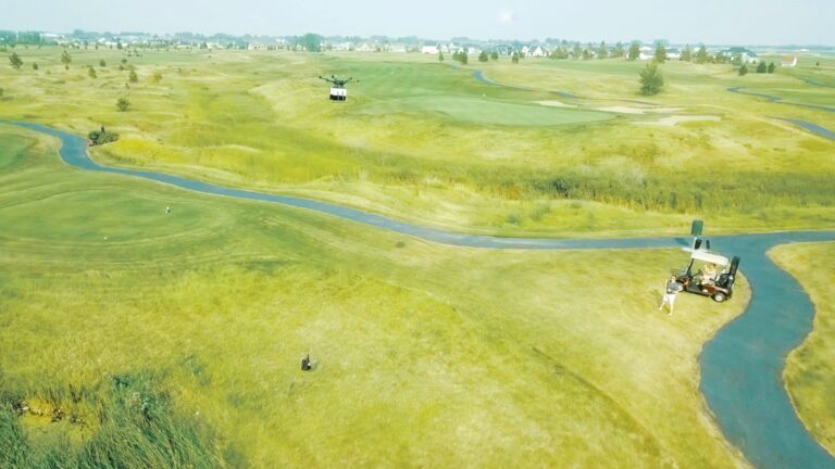 A drone delivering food to golfers at Kingâ€™s Walk in North Dakota. Photo courtesy of Flytrex
