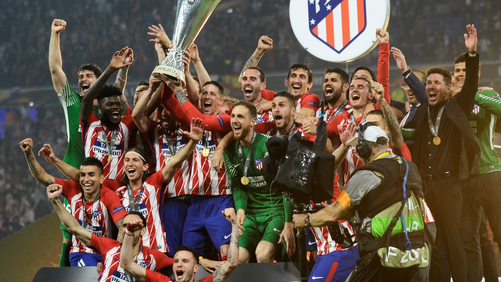 Atletico Madrid players and staff celebrate after the UEFA Europa League Final at Stade de Lyon, May 2018. Photo via Shutterstock.com