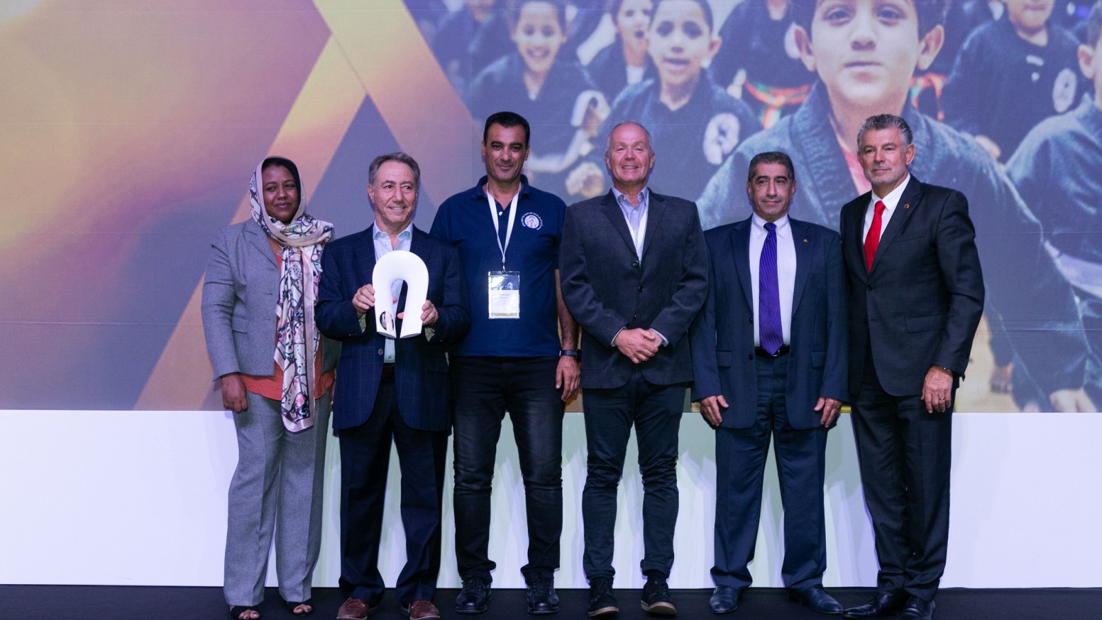 From left, UN Protection Officer Khalifa Rihab; Budo for Peace founder Danny Hakim; BFP COO and Education Director Robeen Arkia; BFP Board Member Harvey Belik; Sensei Keyvan Ghazi, BFP-Greece; and Peace and Sport President and Founder JoÃ«l Bouzou. Photo: courtesy