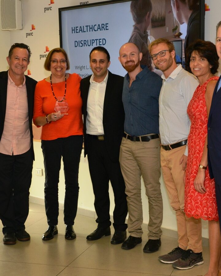 Shown at the Tel Aviv awards event, from left: Wright Lassiter, CEO, Henry Ford Health System; Henry Ford Hospital Chief Surgeon Scott Dulchavsky; Maura Rosenfeld, Chief Business Development Officer, Healthymize; Shady Hassan, CEO, Healthymize; Daniel Aronovich, CTO, Healthymize; Kevin Kotzen, Senior Algorithm Developer, Healthymize; Henry Ford Health System Global Innovation Managing Director Lisa Prasad; and Mark Coticchia, Chief Innovation Officer, Henry Ford Health System. Photo by Oleg Luft/mHealth Israel