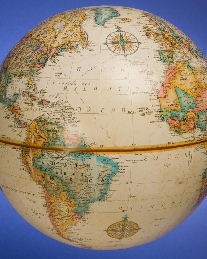 Globe image via Shutterstock.com