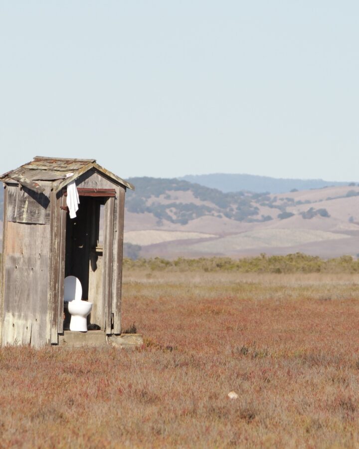 llustrative photo of outhouse by EddieHernandezPhotography via Shutterstock.com
