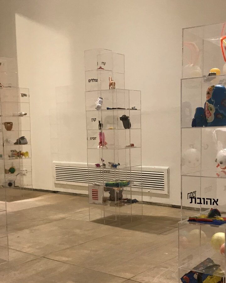 Perspex boxes filled with personal objects personify the city in the Ashdod Project exhibit. Photo by Naama Barak