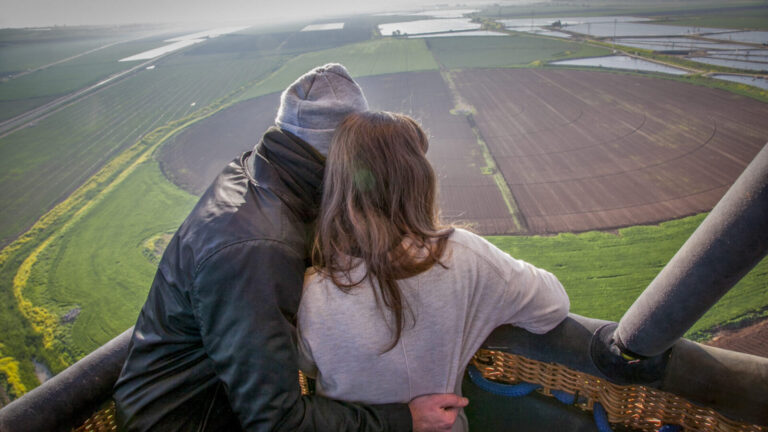 A couple enjoy a hot air balloon ride over the Jezreel Valley in Israel. Photo by Anat Hermoni/Flash90