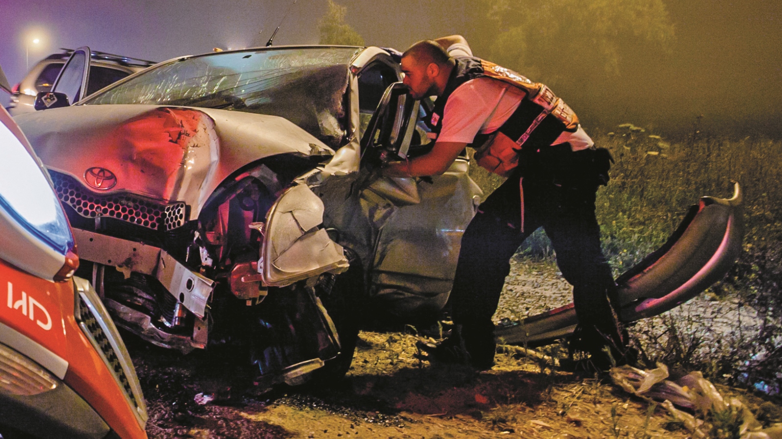 An MDA medic at the scene of a car crash. Photo courtesy of Magen David Adom