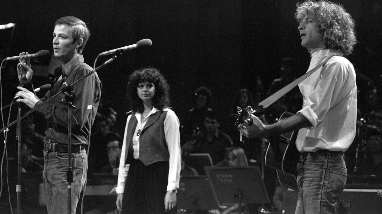 From left, Israeli musicians Arik Einstein, Dafna Armoni and Shalom Hanoch in performance, 1979. Photo by Government Press Office via Wikipedia