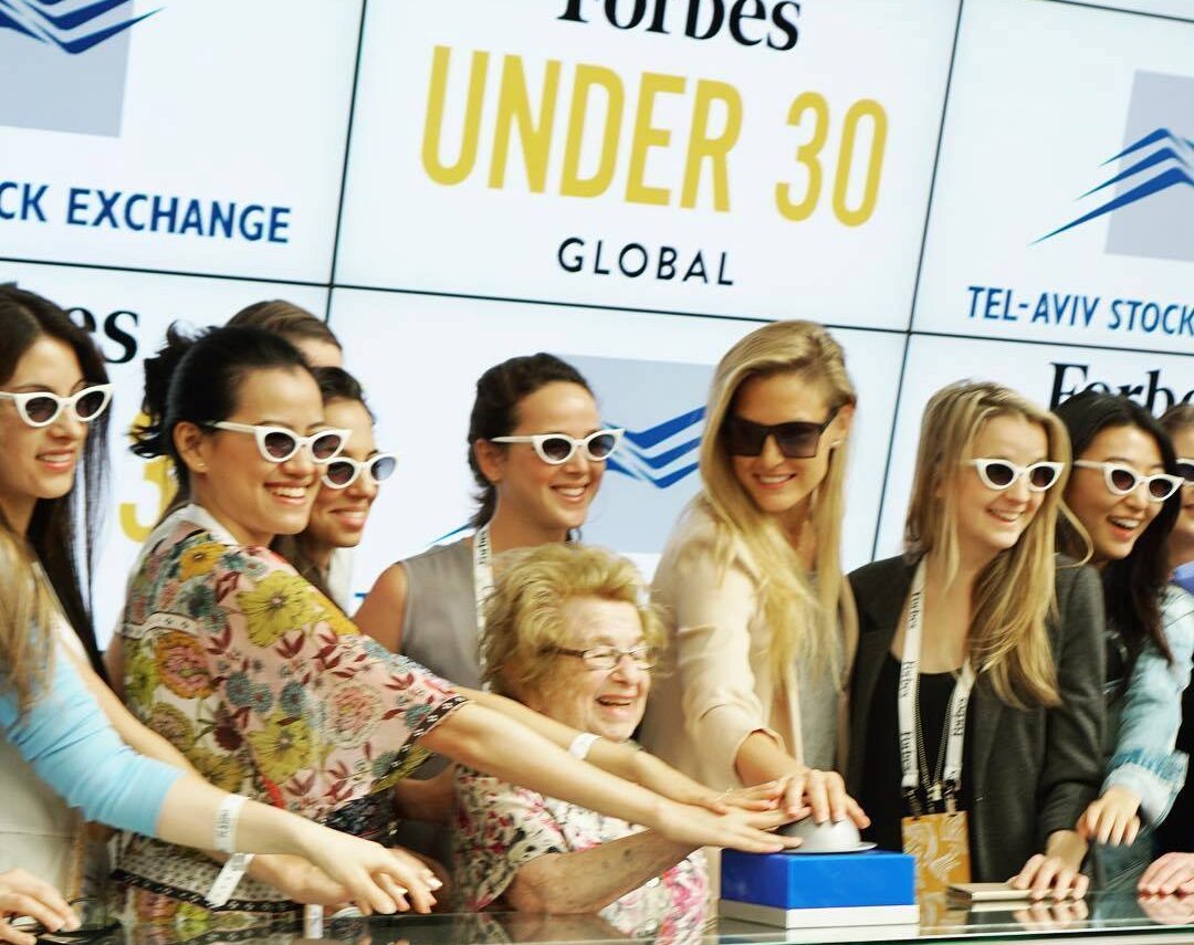 Women in the Forbes 2018 Under 30 Global Summit, including Dr. Ruth Westheimer, ringing the Tel Aviv Stock Exchange Bell. Photo: courtesy