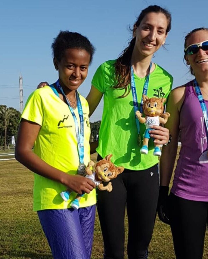 Karawan Halabi, center, with the silver and bronze medalists in the 58th annual Israel Open Field Racing Championship. Photo: courtesy