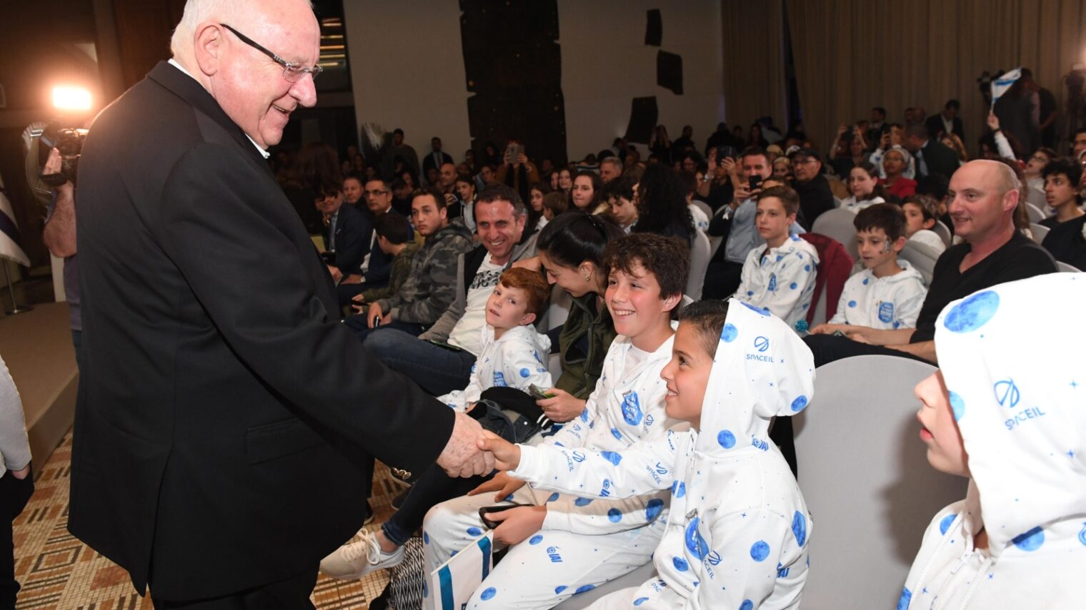 President Reuven Rivlin with children at a moon landing pajama party at his official Jerusalem residence. Photo by Mark Neiman/GPO
